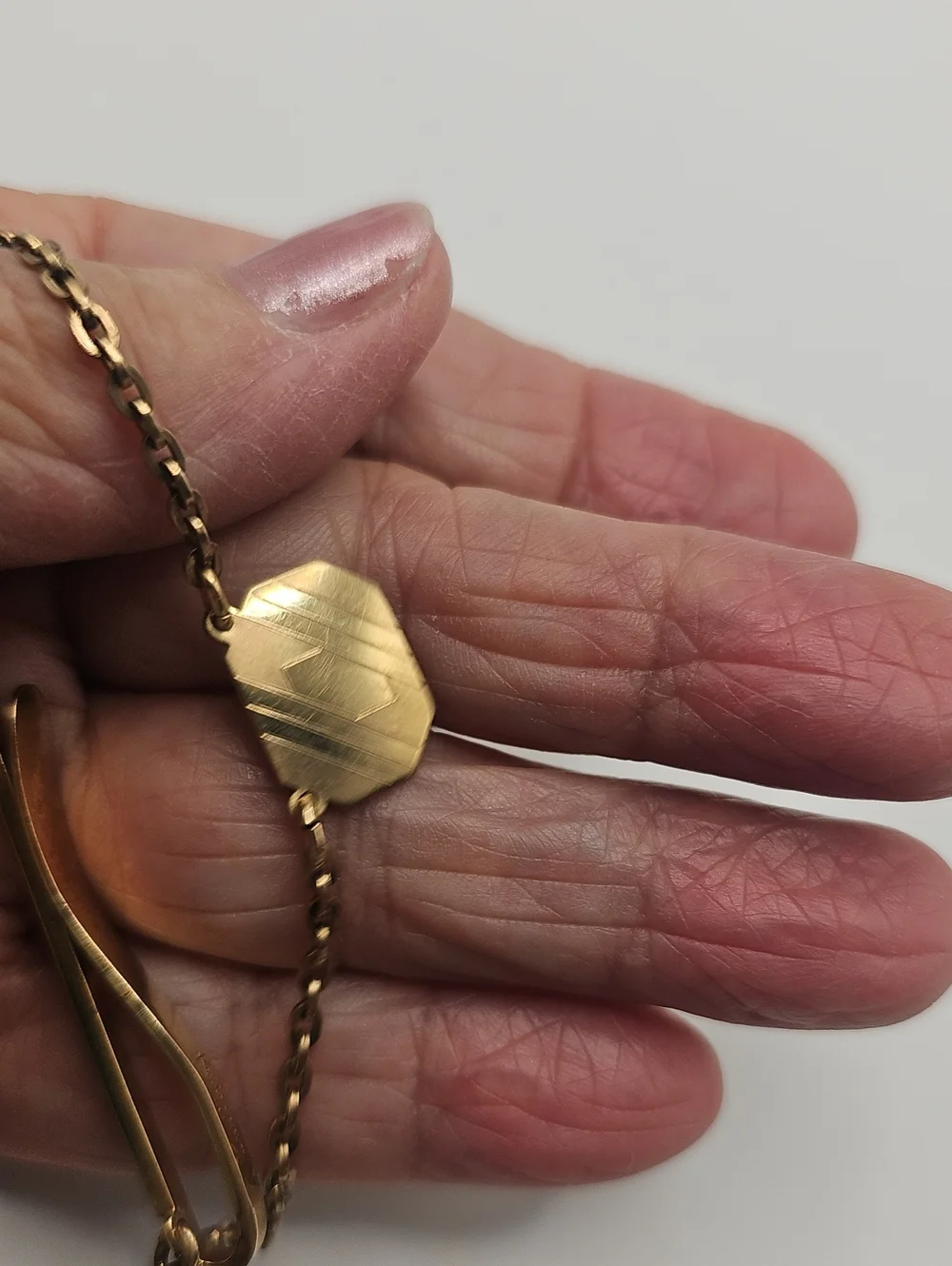 Tie Bar With Draped Chain By KIERSLER. USA Vintage 1940-19508